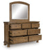Feddinger - 3 Pc. - Queen Sleigh Storage Bed, Dresser And Mirror - Medium Brown