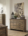 Trinell - Six Drawer Dresser - 61.34" x 15.98" x 42.99" - Brown Dark