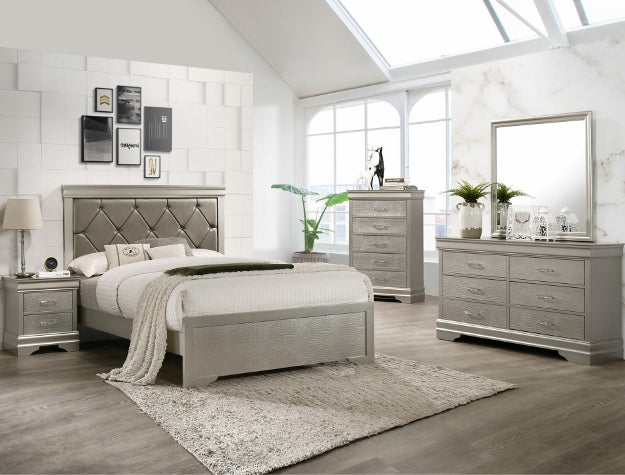 Silver bedroom furniture set with headboard, bed, nightstands, and dresser in a bright room.