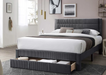 Light gray upholstered platform bed with storage drawer and channel-tufted headboard in Sacramento showroom