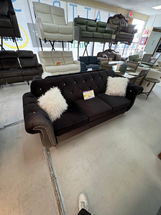 Black velvet two-piece living room set featuring a sofa and loveseat, furniture outlet deal near Carmichael and Citrus Heights.
