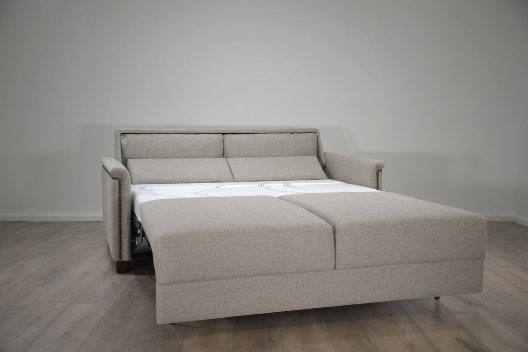 Omnia Leather Retreat sectional sleeper sofa with chaise configuration