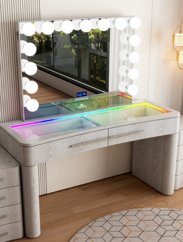 

SlayStation Willow vanity table with RGB lighting and mirror on display at Sacramento Furniture Store