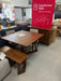 Transformer Nova expandable dining table with matching bench and chairs on display at Sacramento Furniture Store