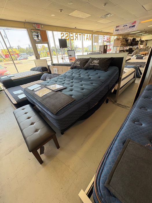 Ashley M9X7 adjustable bed base with powered head and foot articulation available in Queen and King sizes in Sacramento.