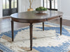Lavinton - 8 Pc. - Dining Room Extension Table, 6 Side Chairs, Server - Brown