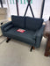 Blue mid-century modern sofa and matching chair on showroom clearance at Sacramento Furniture Store.