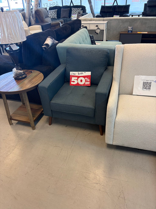Blue upholstered sofa and accent chair with tufted seats and tapered legs at our Sacramento furniture outlet.