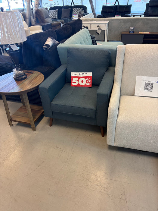 Blue upholstered sofa and accent chair with tufted seats and tapered legs at our Sacramento furniture outlet.