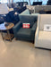 Blue upholstered sofa and accent chair with tufted seats and tapered legs at our Sacramento furniture outlet.