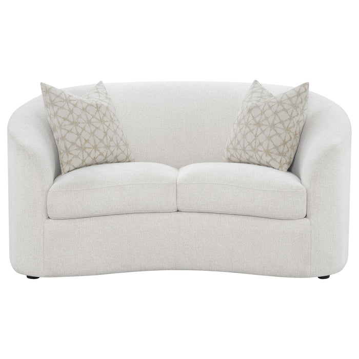 Curved bouclé loveseat in soft latte upholstery on furniture clearance in Sacramento, CA.