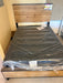 Kaywood mid-century modern panel bed in natural pine and weathered brown on furniture clearance in Sacramento, CA.