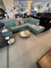 Laguna 111-inch mid-century modern sectional with tufted seating, tapered wood legs and right-facing chaise in aqua upholstery.