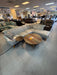 Mid-century modern light gray sectional with vertical tufting and angled wood legs at our Sacramento furniture outlet.